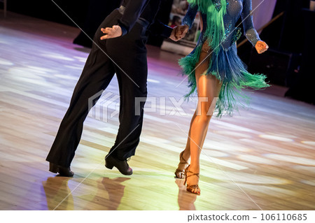 a couple dance a Latin dance. the legs of a dancing couple a couple dance a Latin dance. the legs of a dancing couple 106110685