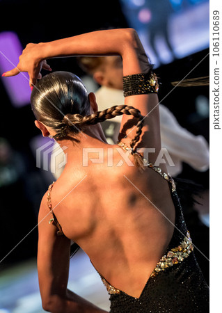 a couple dance a Latin dance. the legs of a dancing couple 106110689