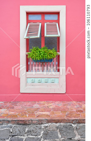 Street view of a colorful facade with window, architecture background, Guayaquil, Ecuador. Street view of a colorful facade with window, architecture background, Guayaquil, Ecuador. 106110793