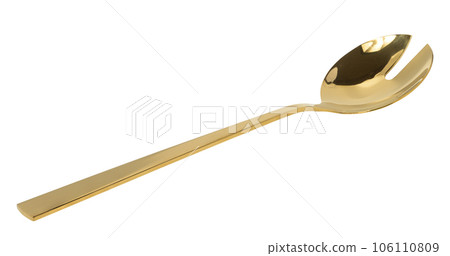 Golden spoon for stirring salad on white isolated background 106110809