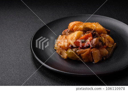Delicious fresh stew of potatoes, tomatoes, onions, carrots and beef 106110978