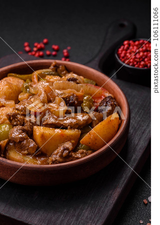 Delicious fresh stew of potatoes, tomatoes, onions, carrots and beef 106111066