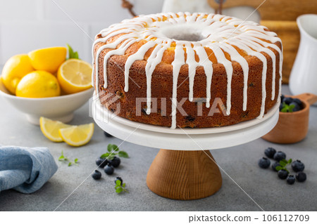 Lemon blueberry pound cake with powder sugar glaze Lemon blueberry pound cake with powder sugar glaze 106112709