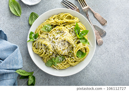 Basil pesto pasta with parmesan and olive oil Basil pesto pasta with parmesan and olive oil 106112727