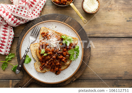 Baked beans with bacon on a toast Baked beans with bacon on a toast 106112751