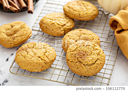 Pumpkin snickerdoodle cookies with cinnamon and milk Pumpkin snickerdoodle cookies with cinnamon and milk 106112770