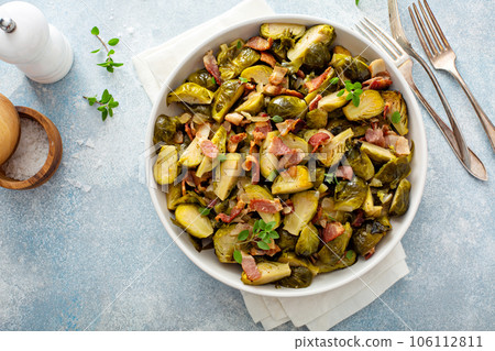 Brussel sprouts cooked with bacon, side dish recipe Brussel sprouts cooked with bacon, side dish recipe 106112811