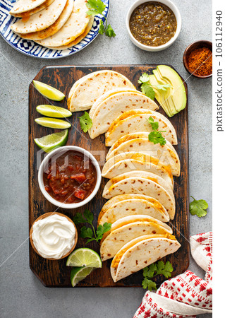 Baked tacos with pulled chicken and cheese 106112940