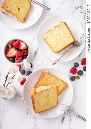 Traditional vanilla pound cake baked in a bundt pan Traditional vanilla pound cake baked in a bundt pan 106112945