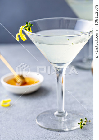 Honey and thyme lemon drop martini 106112978
