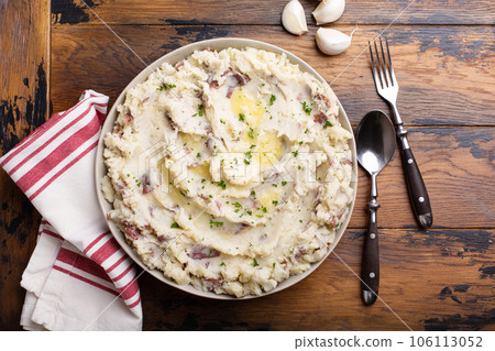 Traditional southern mashed potatoes made with red potatoes 106113052