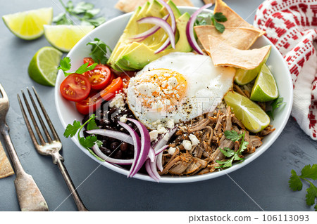 Breakfast burrito bowl with pork carnitas and rice Breakfast burrito bowl with pork carnitas and rice 106113093