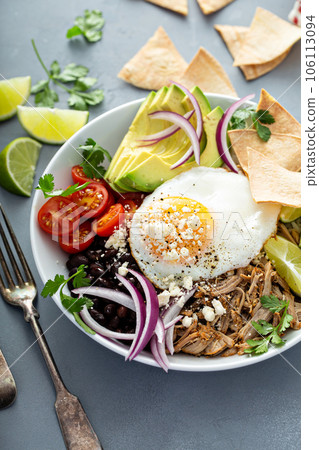 Breakfast burrito bowl with pork carnitas and rice Breakfast burrito bowl with pork carnitas and rice 106113094