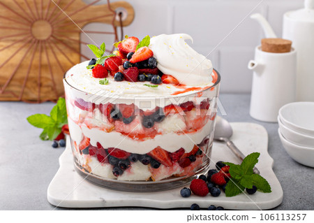 Summer berry trifle with angel food cake in a large bowl Summer berry trifle with angel food cake in a large bowl 106113257