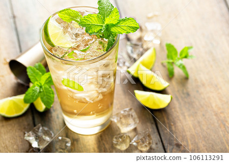 Refreshing summer cocktail with ginger beer and lime Refreshing summer cocktail with ginger beer and lime 106113291