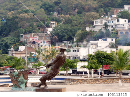 Statue of Fisherman working in Manzanillo Mexico Statue of Fisherman working in Manzanillo Mexico 106113315