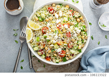Healthy low carb salad with cauliflower rice and chickpeas Healthy low carb salad with cauliflower rice and chickpeas 106113322