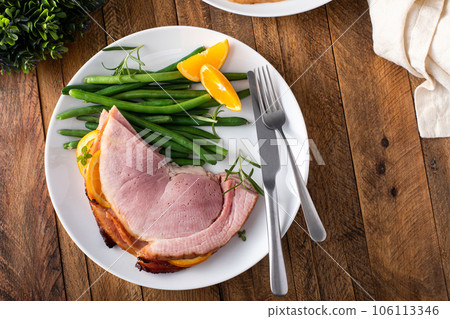 Christmas or Thanksgiving spiral sliced ham with oranges and herbs Christmas or Thanksgiving spiral sliced ham with oranges and herbs 106113346