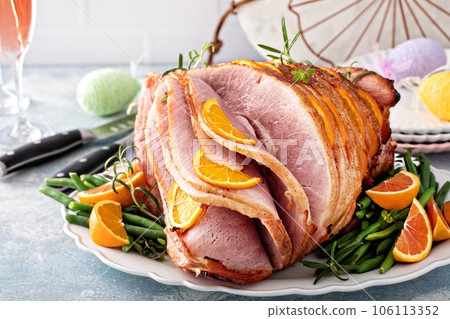 Traditional Easter ham with orange honey glaze 106113352