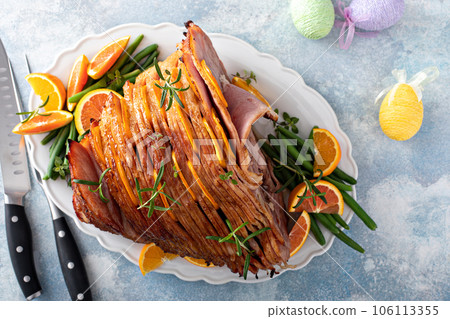 Traditional Easter ham with orange honey glaze Traditional Easter ham with orange honey glaze 106113355