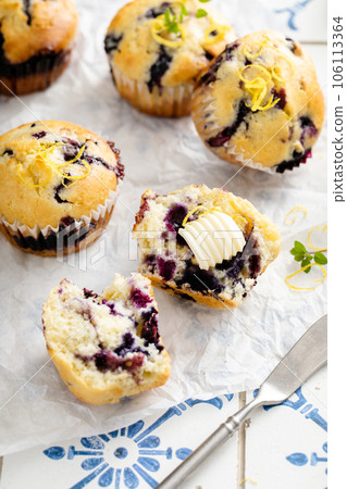 Blueberry muffins with fresh berries and preserves Blueberry muffins with fresh berries and preserves 106113364