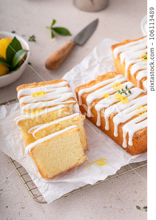Classic lemon pound cake with powdered sugar glaze dripping over Classic lemon pound cake with powdered sugar glaze dripping over 106113489