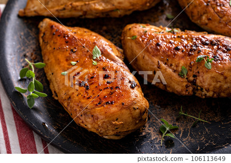 Roasted or seared chicken breast with herbs Roasted or seared chicken breast with herbs 106113649