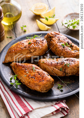 Roasted or seared chicken breast with herbs Roasted or seared chicken breast with herbs 106113650
