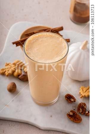 Pumpkin pie smoothie with fall spices and pumpkin puree Pumpkin pie smoothie with fall spices and pumpkin puree 106113713