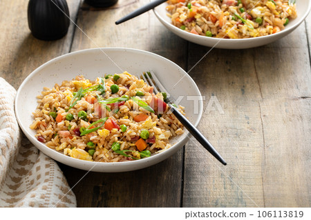 Breakfast fried rice with bacon and scrambled eggs Breakfast fried rice with bacon and scrambled eggs 106113819
