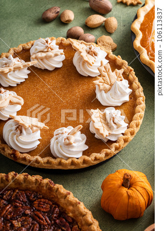 Traditional Thanksgiving pumpkin pie with flaky crust Traditional Thanksgiving pumpkin pie with flaky crust 106113837