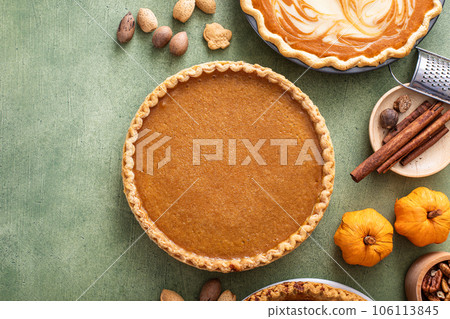 Traditional Thanksgiving pumpkin pie with flaky crust Traditional Thanksgiving pumpkin pie with flaky crust 106113845