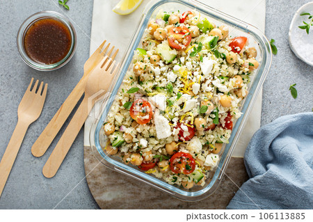 Healthy low carb salad with cauliflower rice and chickpeas 106113885