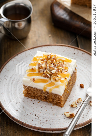Carrot or spice cake with cream cheese frosting Carrot or spice cake with cream cheese frosting 106113917