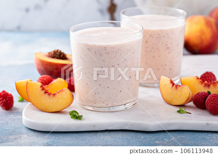 Raspberry peach smoothie, healthy and refreshing drink 106113948