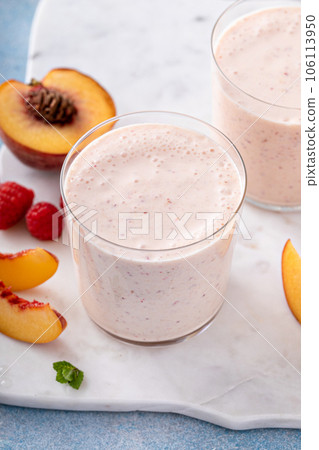 Raspberry peach smoothie, healthy and refreshing drink 106113950
