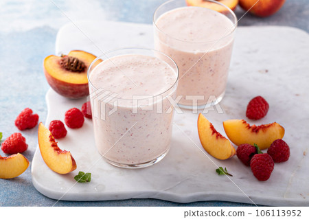 Raspberry peach smoothie, healthy and refreshing drink Raspberry peach smoothie, healthy and refreshing drink 106113952