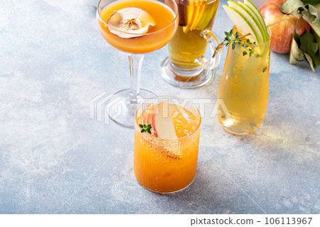 Variety of fall cocktails or mocktails made with apple cider Variety of fall cocktails or mocktails made with apple cider 106113967