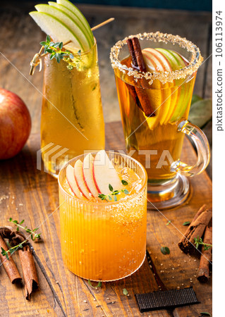 Variety of fall cocktails or mocktails made with apple cider Variety of fall cocktails or mocktails made with apple cider 106113974