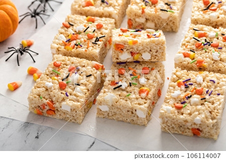 Rice cereal treats for Halloween with festive sprinkles Rice cereal treats for Halloween with festive sprinkles 106114007