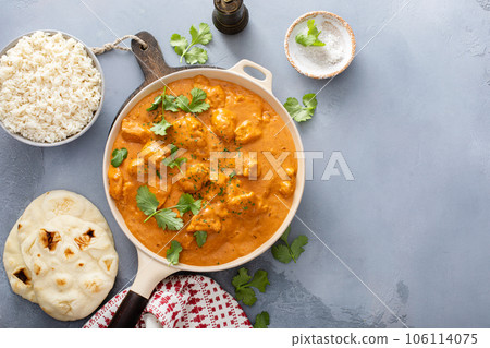 Chicken tikka masala, cooked marinated chicken in spiced curry sauce Chicken tikka masala, cooked marinated chicken in spiced curry sauce 106114075