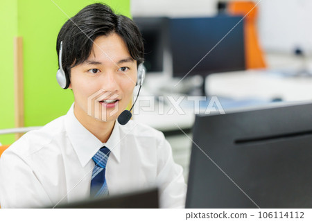 Headset businessman call center image Headset businessman call center image 106114112