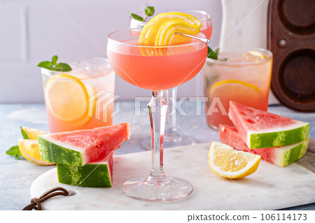 Watermelon and citrus cocktail with lemon garnish Watermelon and citrus cocktail with lemon garnish 106114173