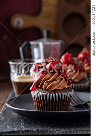 Black forest cupcake with whipped ganache and cherry topping Black forest cupcake with whipped ganache and cherry topping 106114222