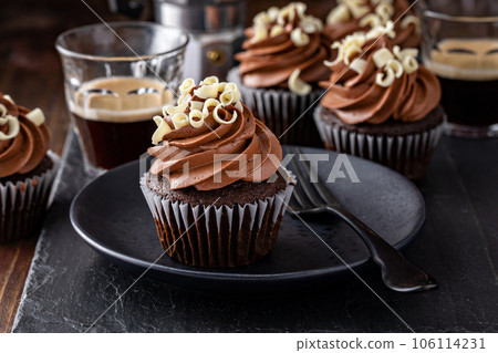 Dark chocolate coffee cupcakes with whipped coffee ganache frosting 106114231