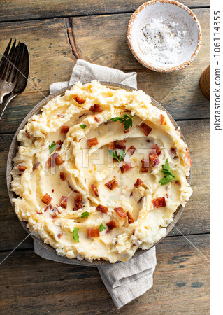 Bacon mashed potatoes with cheddar cheese and parsley Bacon mashed potatoes with cheddar cheese and parsley 106114355
