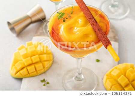 Mangonada margarita coctail, frozen mango margarita with chamoy 106114371