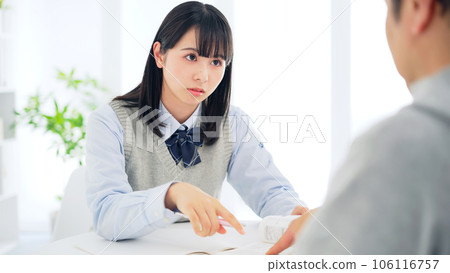 A female student being taught about her studies Individual guidance 106116757
