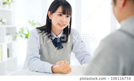 A female student being taught about her studies Individual guidance 106116758