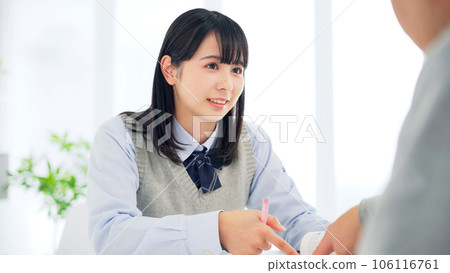 A female student being taught about her studies Individual guidance 106116761